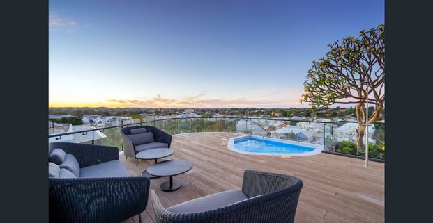 Unfurnished 2-Bedroom, 2-Bathroom Botanical Apartment with Resort-Style Rooftop - Photo 1