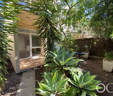 Open the Door To Parkside Living in a Spacious Kensington Townhome - Photo 1