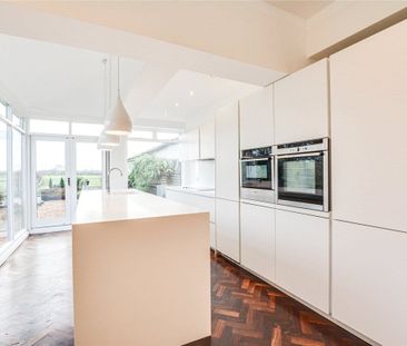 A three bedroom semi-detached family home with a garage and drivewa... - Photo 1