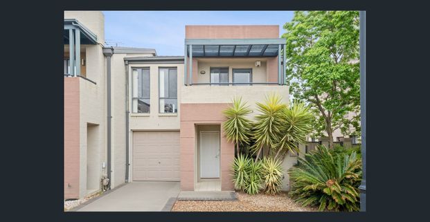 Spacious 4-Bedroom Townhouse with Entertainer's Backyard - Photo 1