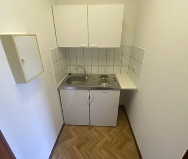 Kleines Single-Apartment in zentraler Stadtlage! - Photo 1