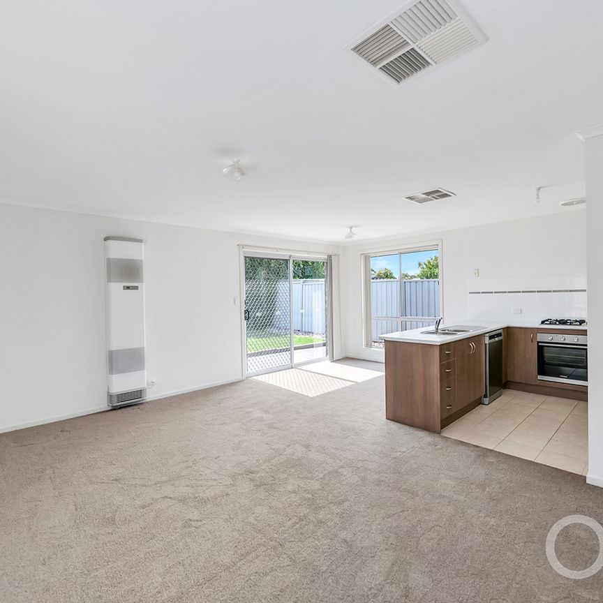 Open the Door to Effortless Coastal Living with Everyday Convenience - Photo 1