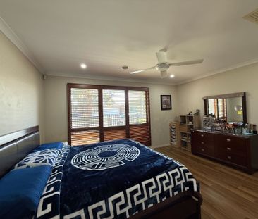 Spacious 4-Bedroom Home with Two Living Areas and Modern Upgrades - Photo 5