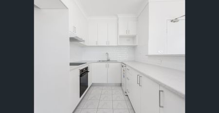 Renovated Top-Floor Apartment with Two Balconies, Enclosed Terrace + Parking - Photo 2