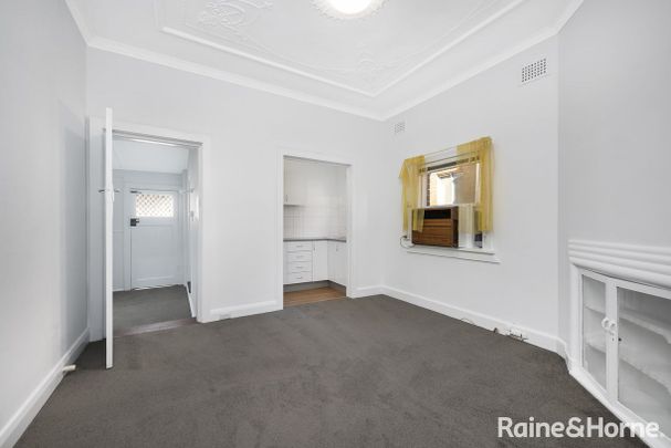 Updated character home next to transport - Photo 1