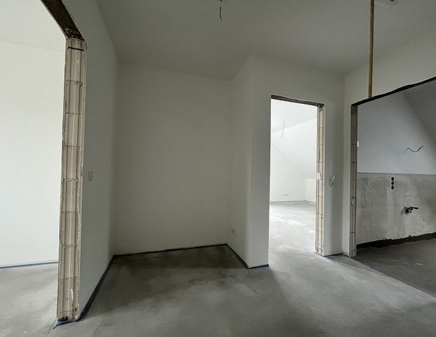 Vermietung: Erstbezug, moderne Obergeschosswohnung mit Balkon und Carport in Westoverledingen - Foto 1