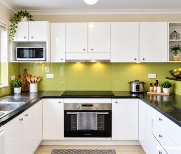 Tidy Double-Brick Corner Townhouse - Photo 3