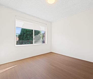 RENOVATED TOP FLOOR APARTMENT!!! - Photo 3