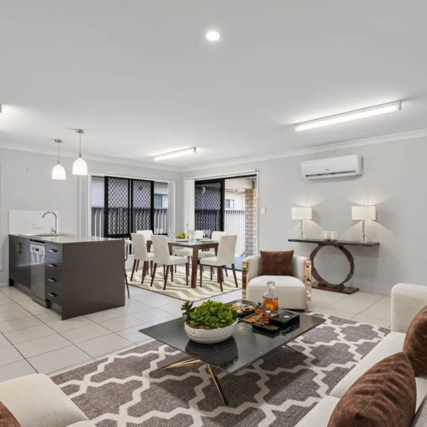 A Comfortable Family Home in Bellbird Park - Photo 1