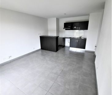 Location Appartement 2 pièces 39m² LAUNAGUET 31140 - Photo 2