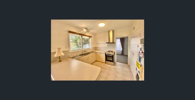 CHARMING FAMILY HOME IN SOUGHT-AFTER ASHWOOD - Photo 1