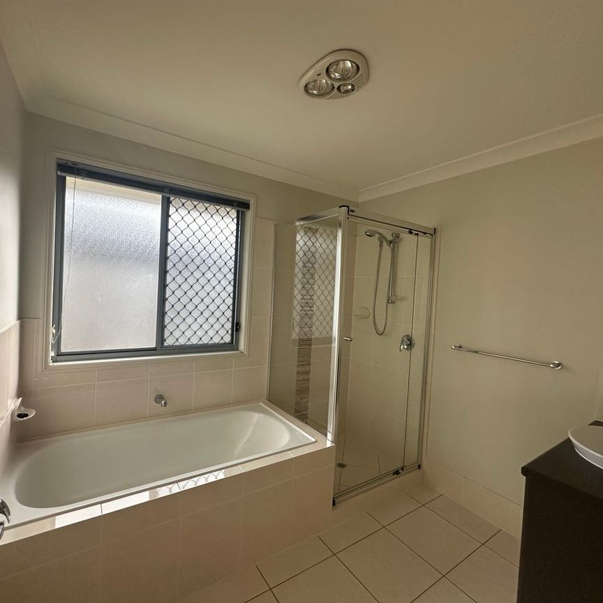 Comfortable and Convenient 4-Bedroom Family Home - Photo 1