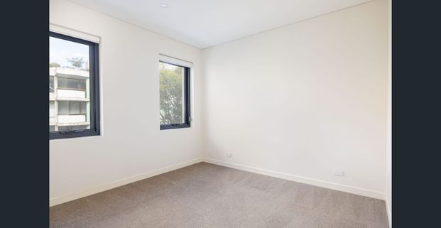 Contemporary city apartment in vibrant village setting - Photo 1