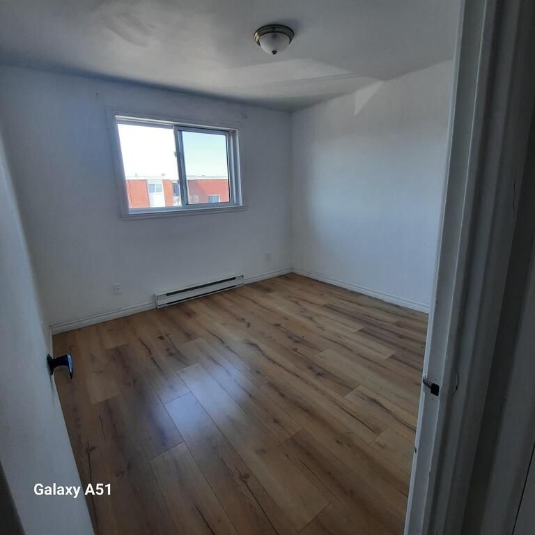 LOGEMENT 4 1/2 EN REPRISE DE BAIL - Photo 1