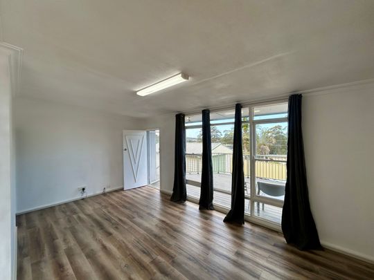 FRESHLY UPDATED HOME IN A FAMILY-FRIENDLY LOCATION - Photo 1