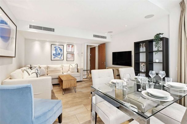 This apartment is located on the second floor of a portered building with lift service. - Photo 1