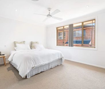 “Well presented townhouse in a convenient location” - Photo 1