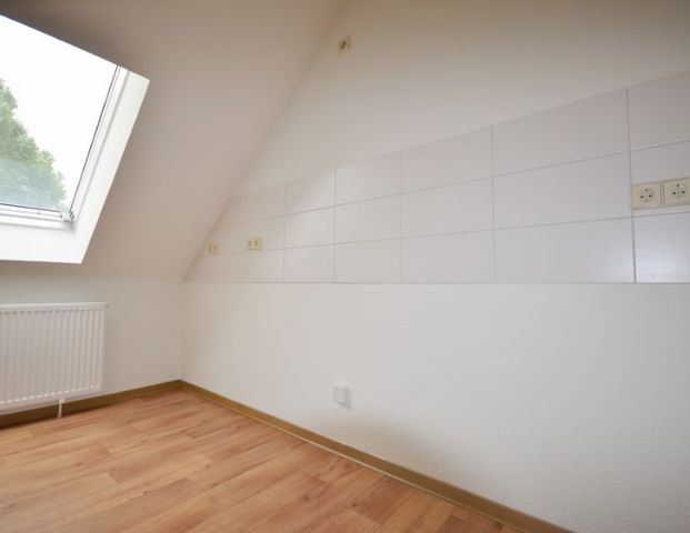 Charmante und großzügige Dachgeschosswohnung! - Foto 1