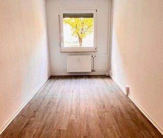 Sofort bezugsfertig: Familienfreundliche 4-Zimmerwohnung im Erdgesc... - Foto 3