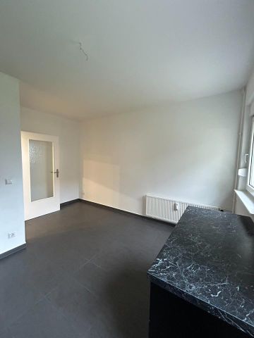 IHR NEUER RÜCKZUGSORT – Moderne EG-Wohnung mit Balkon, EBK & Wohlfühlbad - Photo 3