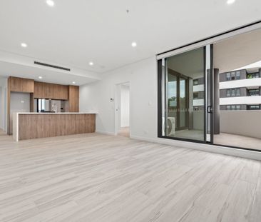 Luxury Living at the Archibald – Stunning Water & District Views - Photo 1