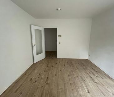 Helle Erdgeschosswohnung – mit Einbauküche und Pachtgarten auf Wunsch - Foto 1