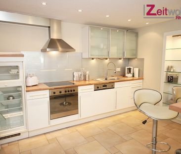 Exklusive möblierte Souterrain-Wohnung mit Terrasse in ruhiger Lage - Photo 5