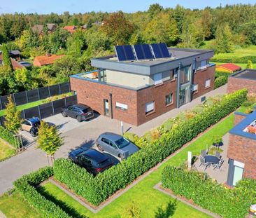 KfW 55: Exklusives Penthouse mit Einbauküche und 50 m² Dachterrasse... - Foto 1