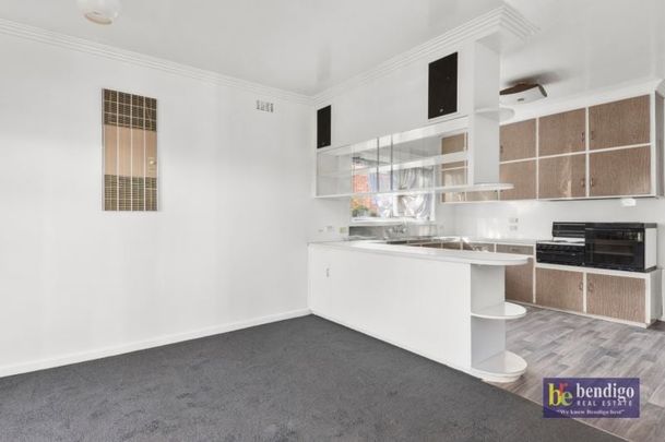 Convenient Living in the Heart of Flora Hill - Photo 1