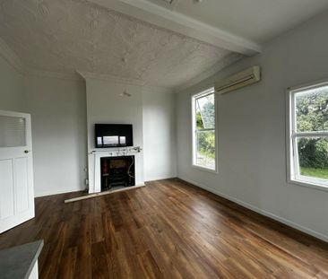Tastefully renovated three bedroom home - Photo 1