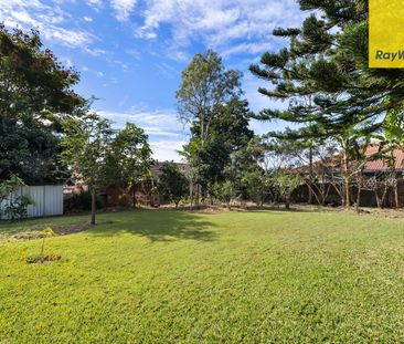 Spacious High-Set Brick Home with Pool & Entertaining - Photo 4