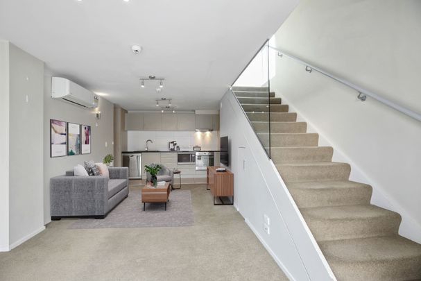 Stylish two-bedroom apartment puts you in the heart of the city - Photo 1