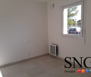 T3 AVEC TERRASSE ET DEUX PARKINGS - Photo 2