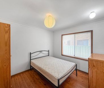 DECEPTIVELY SPACIOUS AND IN PRIME LOCATION! - Photo 4