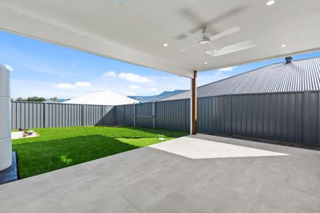 Modern 3-Bedroom Duplex Offering Style and Low-Maintenance Living! - Photo 2