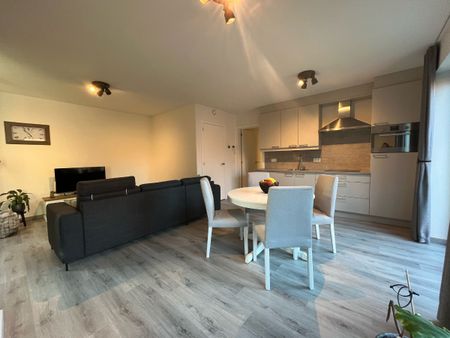 Gelijkvloers appartement met 2 slaapkamers en tuin - Foto 2