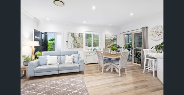 Modern duplex with a large yard - Photo 1