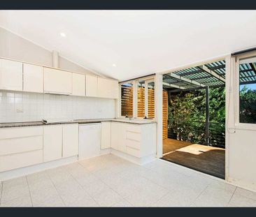 Charming 2-Bedroom Home with Courtyard & Character Features - Photo 2