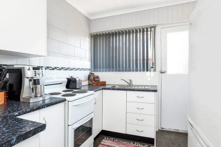Coastal Convenience Meets Low-Maintenance Living - Photo 3