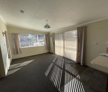 Spacious Three-Bedroom Home in Desirable Location - Photo 5