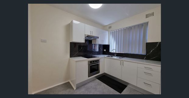 Charming Two-Bedroom Apartment in Cozy Complex - Photo 1