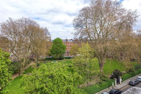 A refurbished top floor Penthouse in this impressive red brick mansion block. - Photo 3