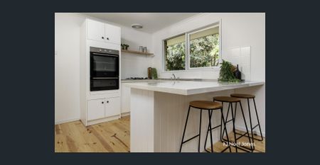 PERFECTLY POSITIONED, LOW-MAINTENANCE LIVING - Photo 2