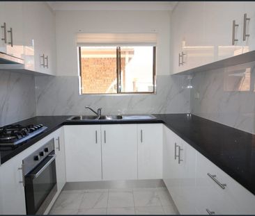 Convenient Townhouse in a Prime Location - Photo 2