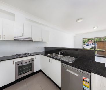 Ground Floor One Bedroom Unit - Photo 2