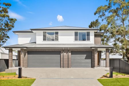 Brand New Designer Duplex Offering Space, Style & Family Comfort - Photo 2