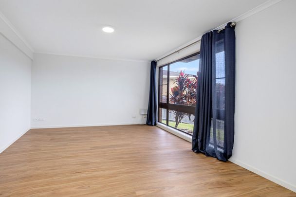 Modern, Light-Filled Family Home with Lawn Mowing Included! - Photo 1