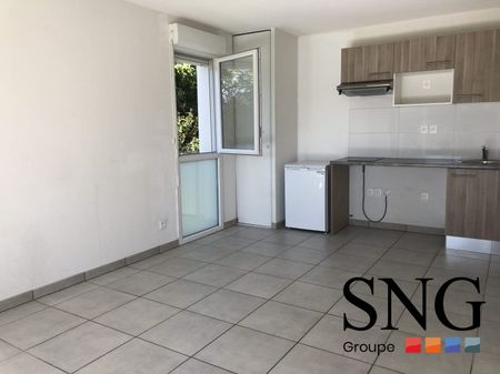 T2 AVEC JARDIN ET PARKING - Photo 4