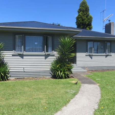 The home features three bedrooms, a spacious kitchen, an open-plan dining and living area and low-maintenance grounds. - Photo 3