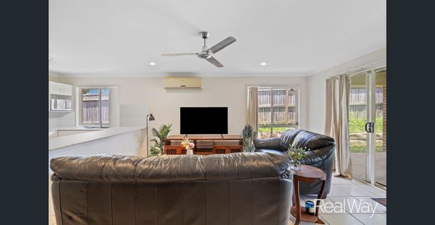 Modern Family Living in the Heart of Raceview - Photo 1